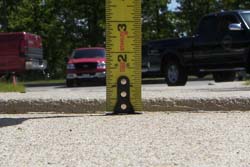 Concrete walkway tripping hazard repair at Westford Highway Department using slabjacking