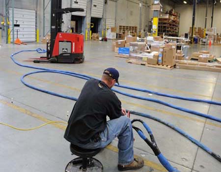 Polyurethane Injections were performed to stabilize the curled concrete slabs