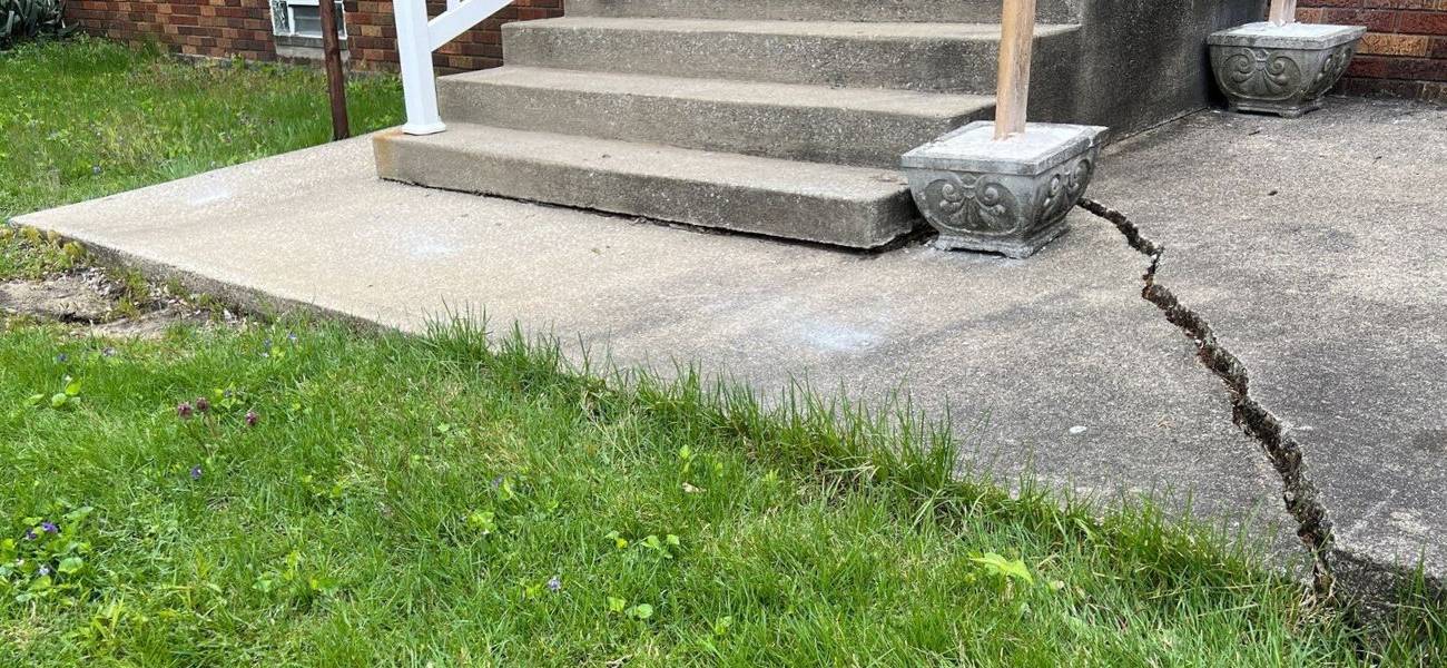 tripping hazard coming down from some concrete stairs