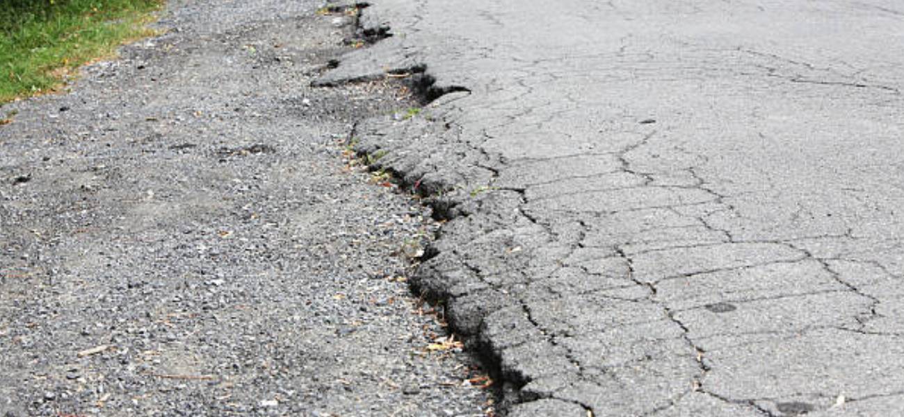 cracks in an uneven road